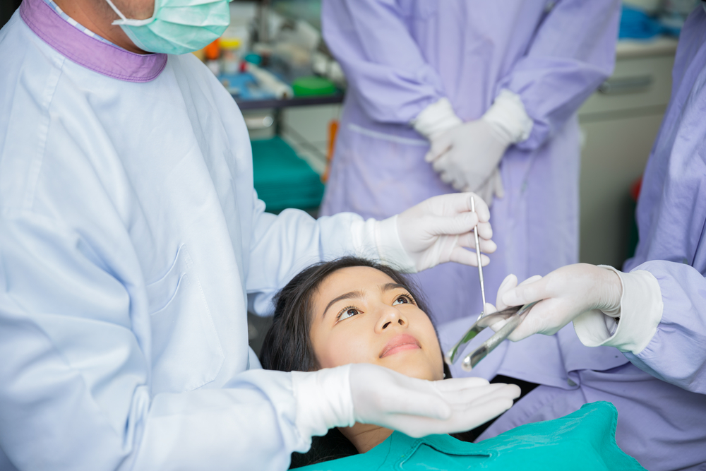 Dentist,Curing,A,Asian,Female,Patient