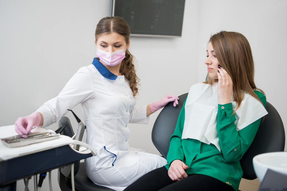 Young,Woman,At,The,Dentist,Complaining,About,A,Toothache.,Female